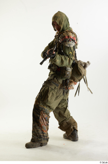 Photos John Hopkins Army Postapocalyptic Suit Poses aiming the gun…